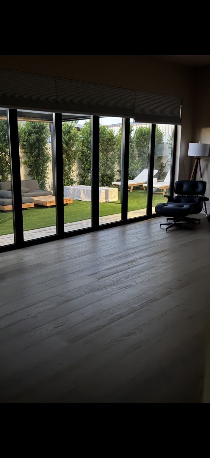 Folding glass wall opening the ADU to its courtyard